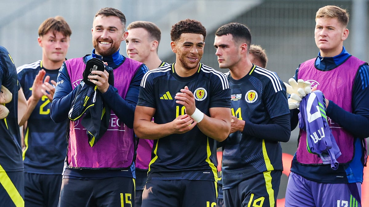 Che Adams celebrates Scotland's win over Liechtenstein