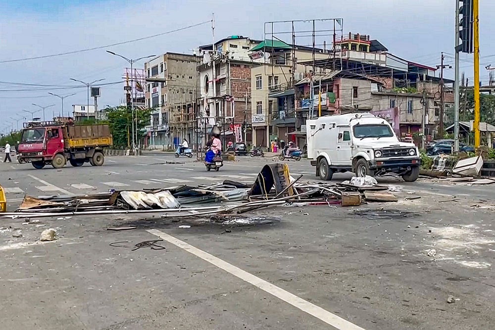 | Photo: PTI : Protests in Manipur