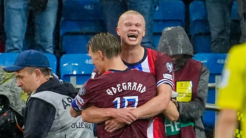 Erling Haaland and Martin Odegaard celebrate Norways win over Estonia