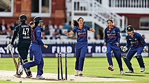 | Photo: Getty Images : Out!: India’s Renuka Singh celebrates after taking the wicket of England’s Sophia Dunkley at London’s Lord’s in 2022