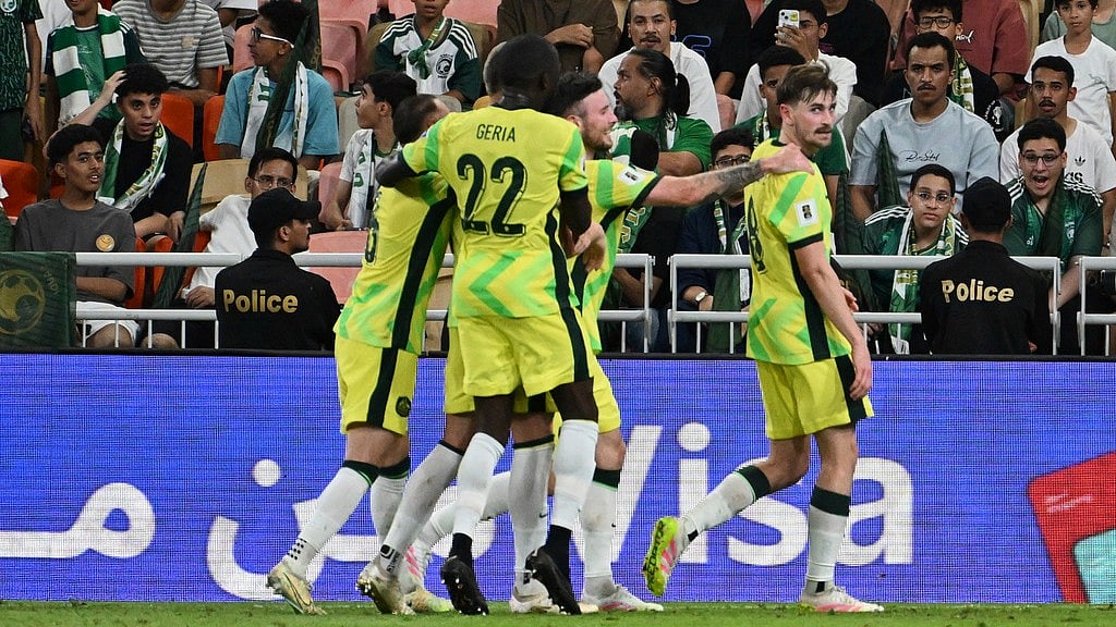 Photo: AP : Australia's Connor Metcalfe, right, celebrates after scoring his side's opening goal against Saudi Arabia during the FIFA World Cup 2026 Asian qualifying Group C match at King Abdullah Stadium in Jeddah, Saudi Arabia.