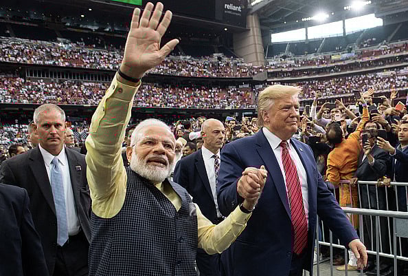 SAUL LOEB/AFP via Getty Images : US President Donald Trump and Indian Prime Minister Narendra Modi attend "Howdy, Modi!" at NRG Stadium in Texas in 2019
