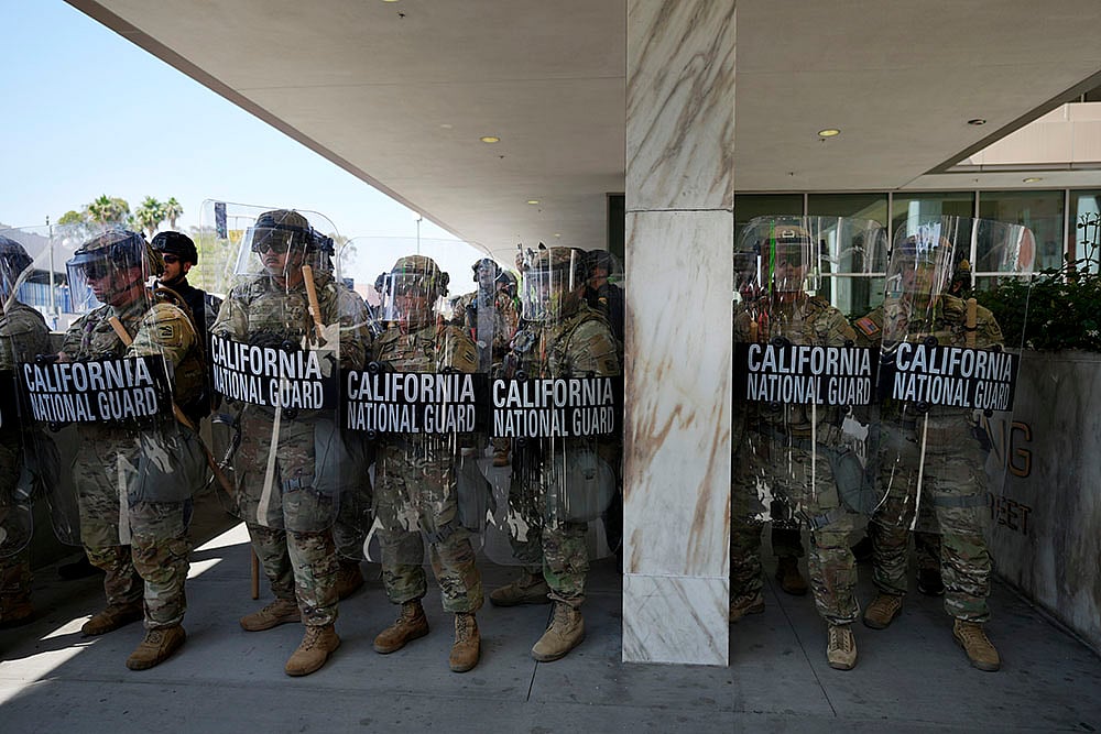 | Photo: AP/Jae Hong : LA protests over ICE raids