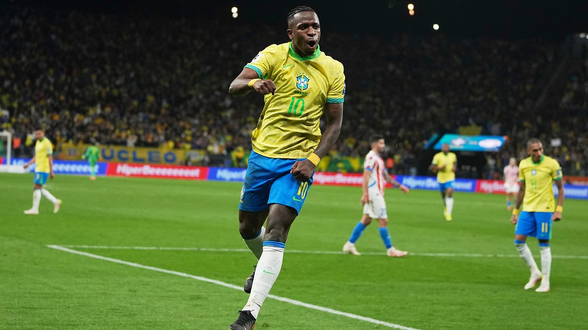 | Photo: AP/Andre Penner : Brazil's Vinicius Junior celebrates scoring his side's opening goal against Paraguay during a World Cup 2026 qualifying soccer match at Neo Quimica Arena in Sao Paulo, Tuesday, June 10, 2025.