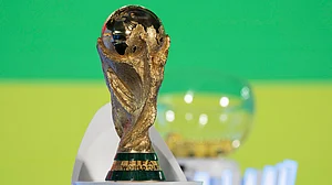 File/AP : The World Cup trophy is displayed before the UEFA preliminary draw for the 2026 FIFA World Cup tournament at FIFA headquarters in Zurich, Switzerland.