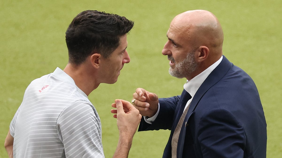 Poland's Robert Lewandowski and Michal Probierz.
