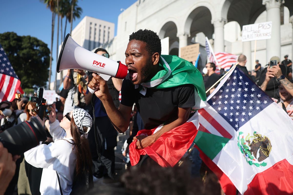 Ethan Swope/AP : Immigration protests in Los Angeles