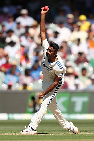 ADELAIDE, AUSTRALIA - DECEMBER 07: Ravichandran Ashwin of India bowls during day two of the Men's Test Match series between Australia and India at Adelaide Oval on December 07, 2024 in Adelaide, Australia.