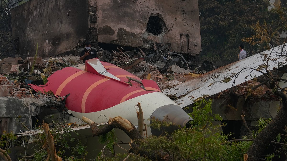 Parts of an Air India plane that crashed on Thursday are seen on top of a building in Ahmedabad, India, Friday, June 13, 2025. -  (AP Photo/Rafiq Maqbool)


