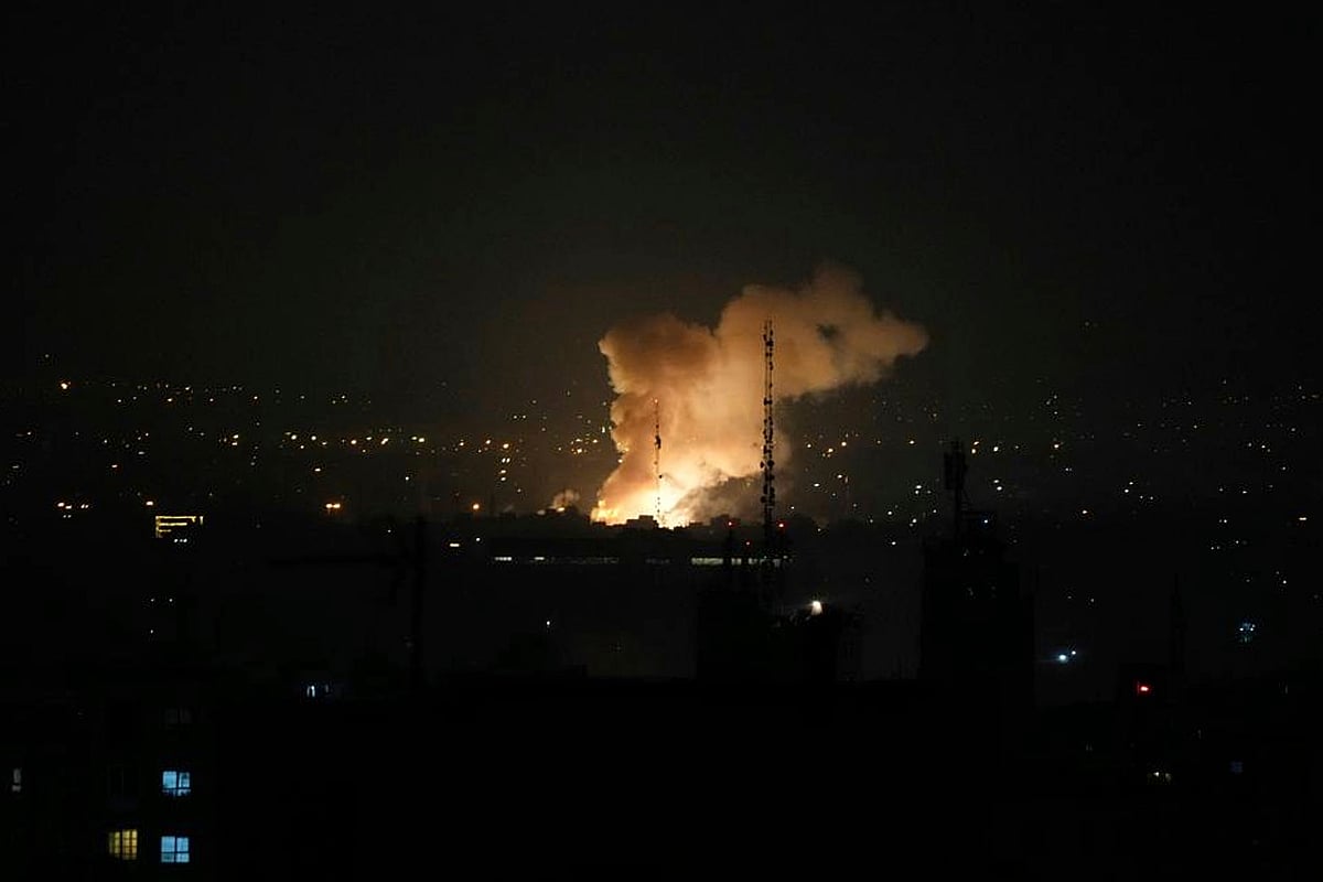 AP Photo/Vahid Salemi : Smoke rises after an explosion in Tehran after Israel attacked Iran's capital on Friday, 