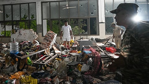 Rescue efforts at the site of the Air India flight crash on June 12, 2025 in Ahmedabad, India. 265 people died and many others were injured after the Air India 171 flight headed to London from Ahmedabad crashed moments after take-off. The plane crashed on a resident doctors' hostel in Ahmedabad, which suffered major damage in the accident.