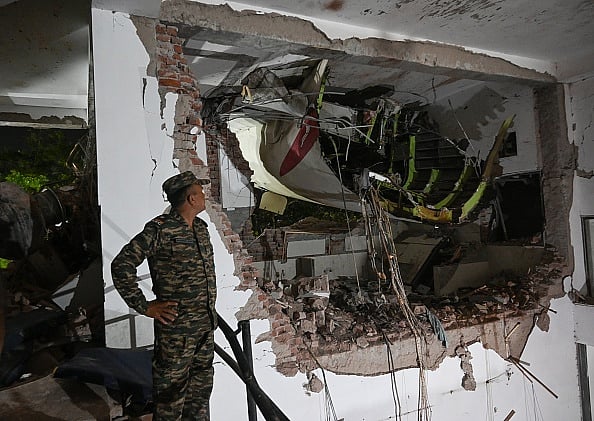 Getty images : Security personnel at the Air India crash site in Ahmedabad