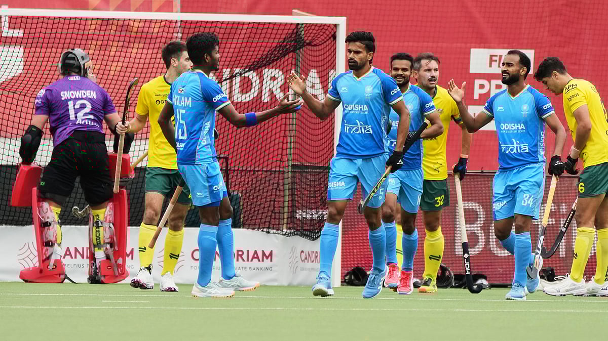 | Photo: AP/Virginia Mayo : India's Abhishek, center right, is congratulated after scoring the opening goal during the FIH Hockey Pro League game between Australia and India at the Wilrijkse Plein in Antwerp, Belgium, Saturday, June 14, 2025.