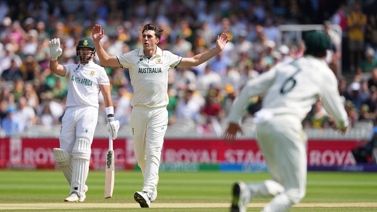 Australia's captain Pat Cummins, center, reacts after bowling a delivery on day four of the World Test Championship final between South Africa and Australia at Lord's cricket ground in London, Saturday, June 14, 2025.  - (AP Photo/Kirsty Wigglesworth)
