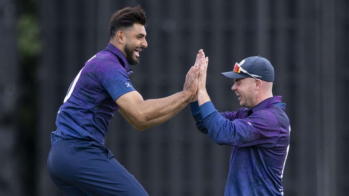 X/Cricket Scotland : Safyaan Sharif (left) picked up two crucial Netherlands wickets for Scotland in the first T20I.