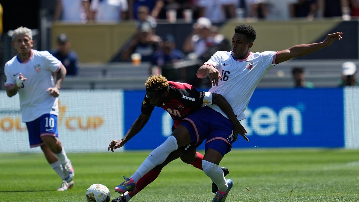 Trinidad and Tobago midfielder Kevin Molino, foreground left. AP