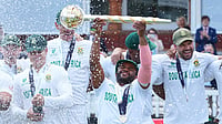 AP : South Africa captain Temba Bavuma holds the winner's trophy and celebrates with teammates after their win in the ICC World Test Championship 2025 final against Australia at Lord's.