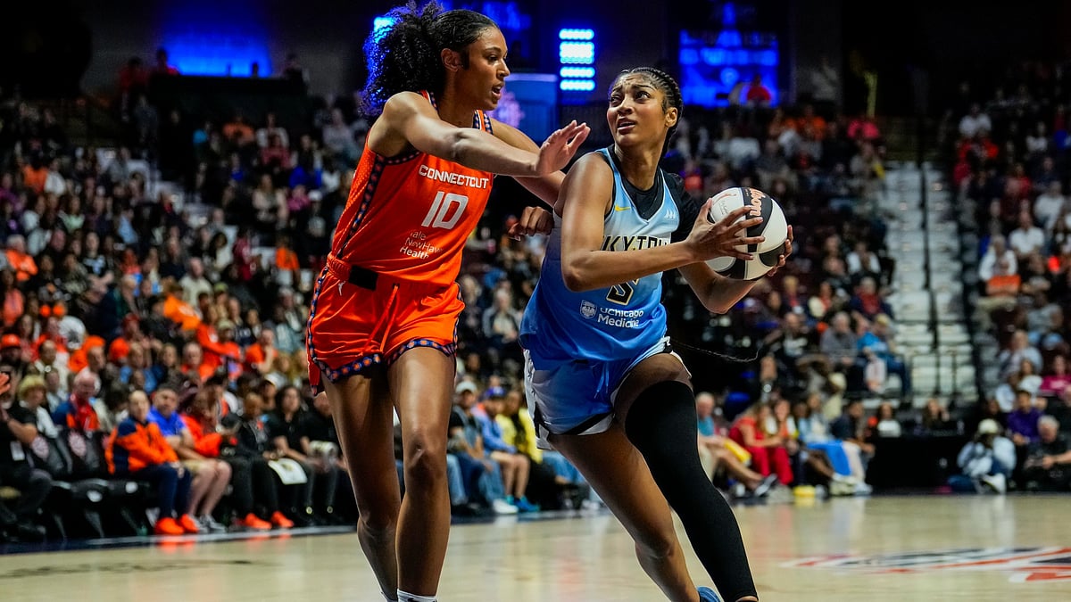 Angel Reese #5 of the Chicago Sky drives to the rim against Olivia Nelson-Ododa #10 of the Connecticut Sun during the second half of a WNBA basketball game at Mohegan Sun Arena on June 15, 2025 in Uncasville, Connecticut.