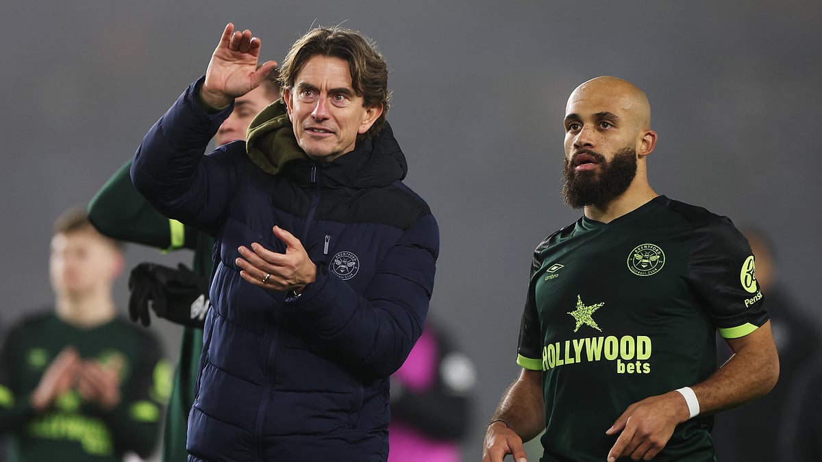 Former Brentford head coach Thomas Frank and Bryan Mbeumo - null