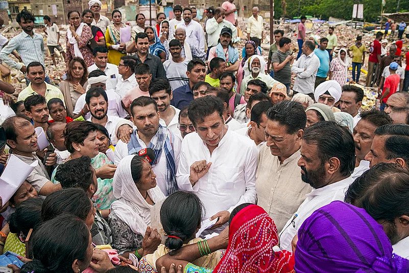 Devender Yadav visits demolished areas in Delhis Govindpuri
