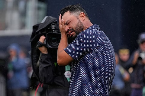 J.J. Spaun celebrates
