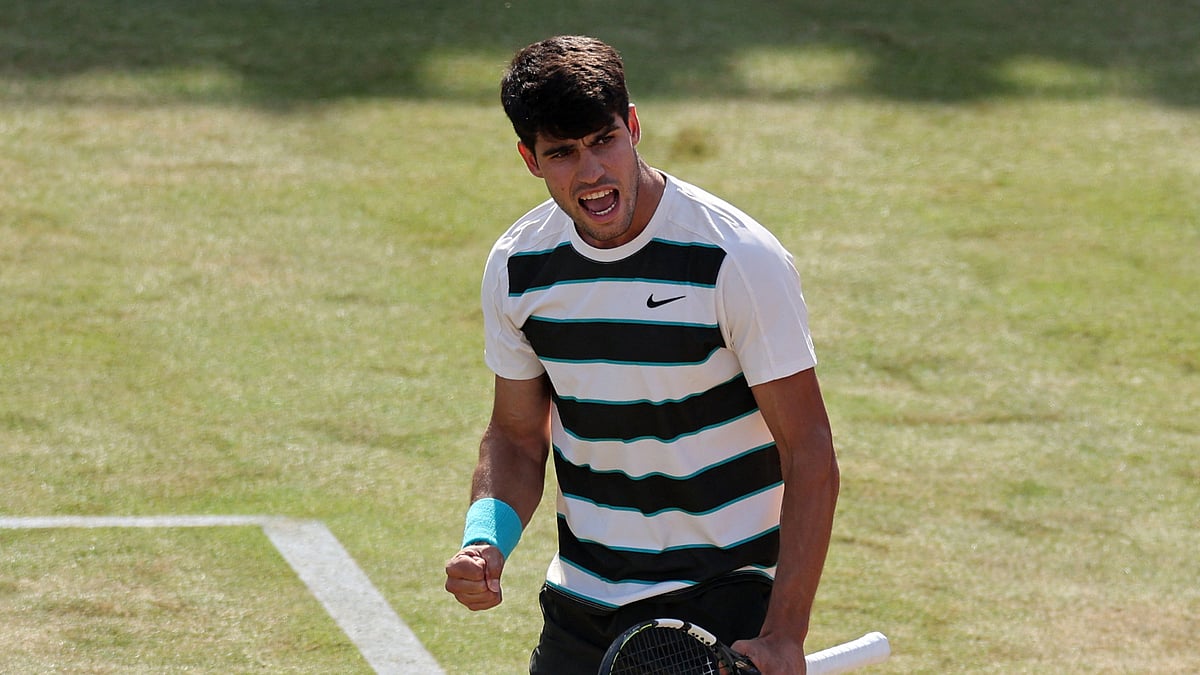 Carlos Alcaraz celebrates his win at Queen's.