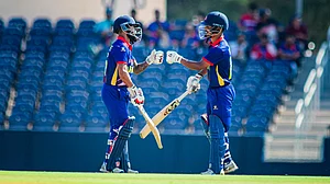| Photo: X/CricketNep : Nepal’s Rohit Paudel and Dipendra Singh Airee ahead of the third Super Over against the Netherlands.