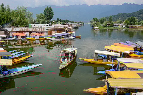 J&K Tourism: Tourists take a shikara ride in the Dal Lake