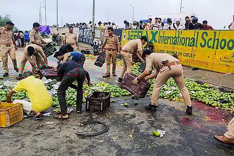 Vehicle carrying mangoes falls off flyover in Agra
