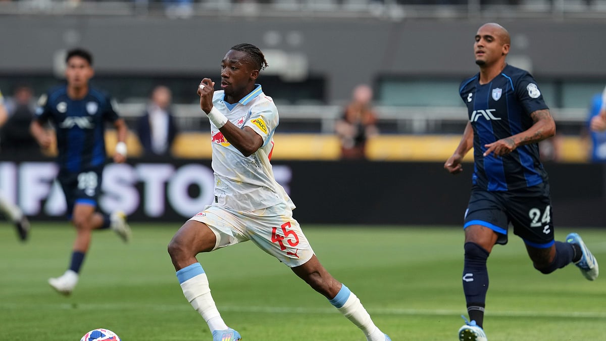 Red Bull Salzburgs Dorgeles Nene runs with the ball during. AP