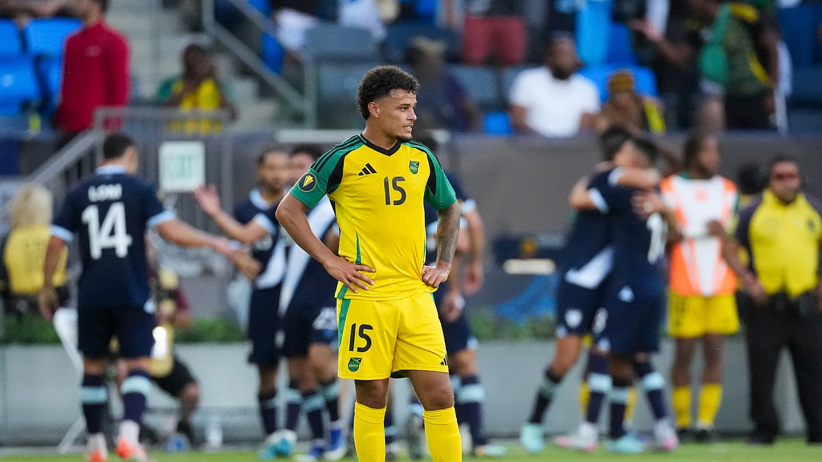 AP Photo/Jae C. Hong : Jamaica defender Joel Latibeaudiere (15) stands on the field as Guatemala players celebrate a goal by midfielder Oscar Santis during the first half of a CONCACAF Gold Cup football match Monday, June 16, 2025, in Carson.