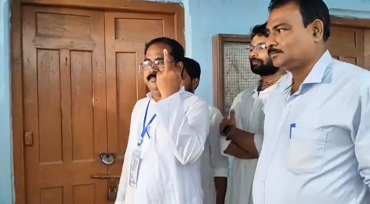 X : BJP's candidate from Kaliganj, Ashis Ghosh, with Ink on middle finger