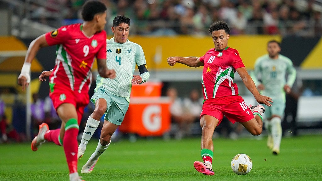 AP/Julio Cortez : Suriname midfielder Denzel Jubitana (10) shoots against Mexico during a CONCACAF Gold Cup soccer match Wednesday, June 18, 2025, in Arlington.