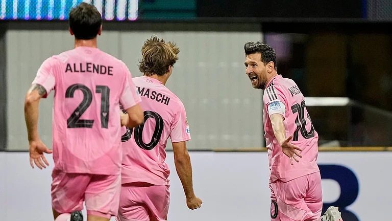 Inter Miami's Lionel Messi, right, celebrates after scoring his side's second goal during the Club World Cup group A soccer match between Inter Miami and FC Porto in Atlanta, Thursday, June 19, 2025. - (AP Photo/Brynn Anderson)