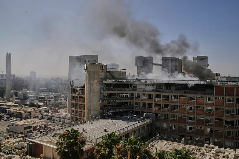 Smoke raises from the building of the Soroka hospital complex