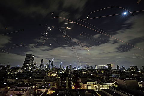 In Attack Mode: The Israeli  ‘Iron Dome’ fires to intercept Iranian missiles during a strike over Tel Aviv 
on June 15, 2025 