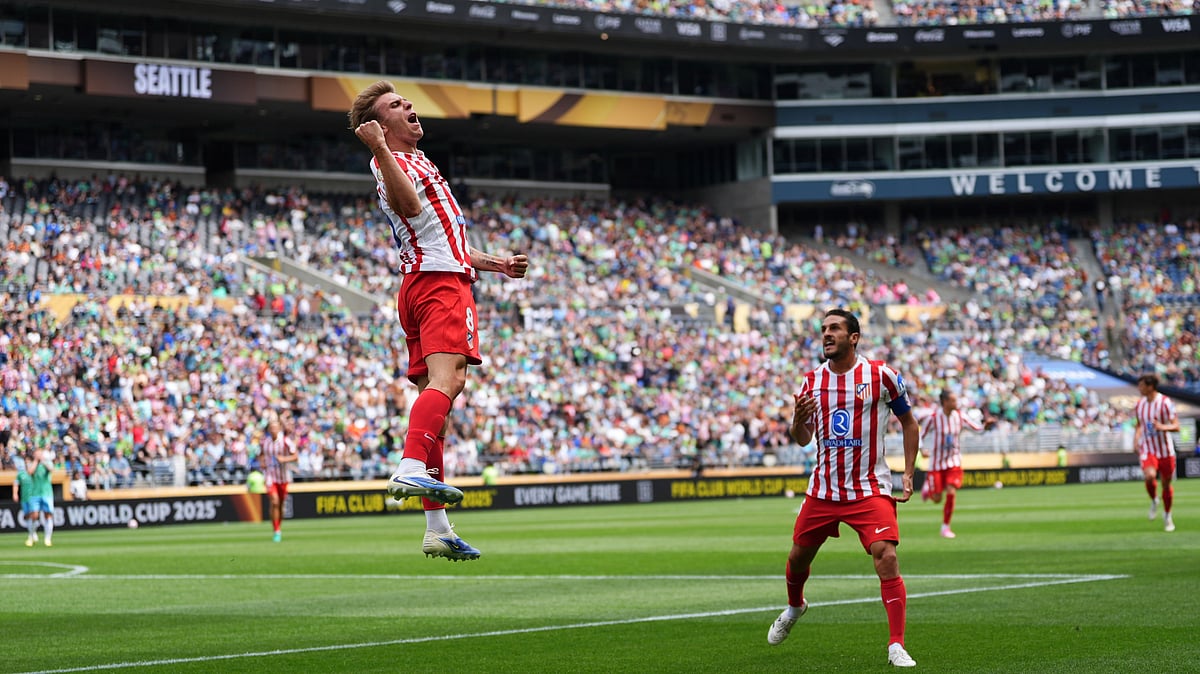 (AP Photo/Lindsey Wasson) : Atletico Madrid's Pablo Barrios celebrates scoring his side's opening goal during the Club World Cup group B soccer match between Seattle Sounders and Atletico Madrid in Seattle, Thursday, June 19, 2025. 