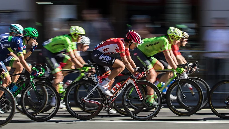 Cyclists racing in aerodynamic gear