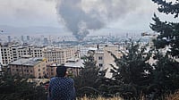 | Getty Images | :  Smoke rises after a reported Israeli strike on a building used by Islamic Republic of Iran News Network, part of Iran's state TV broadcaster, on June 16, 2025 in Tehran, Iran.