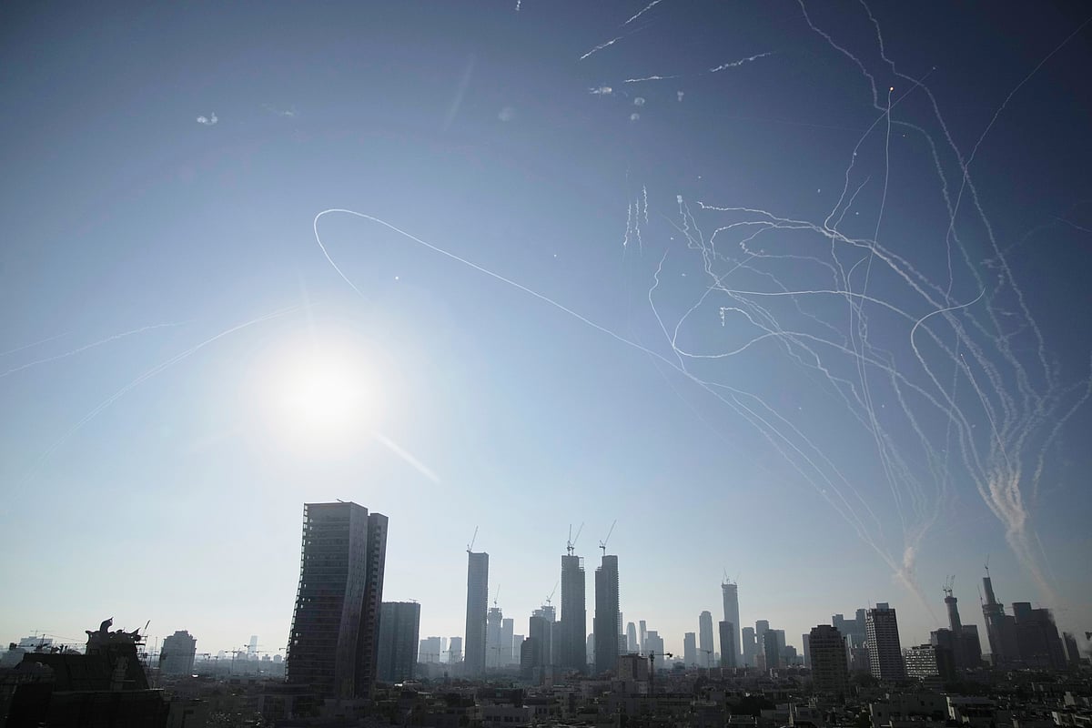 Israeli air defense system fires to intercept missiles during an Iranian attack over Tel Aviv - AP Photo/Leo Correa