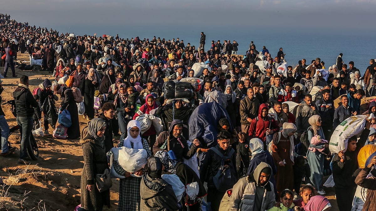 | ShutterStock | : Displaced Palestinians return to their homes in Gaza City and the north via Netzarim after a year and a half of displacement, as part of the ceasefire agreement, on January 26, 2025