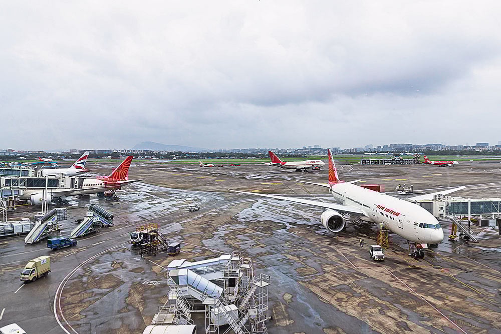 | Photo: Getty Images : Turbulent Times: Air India planes at the Mumbai airport