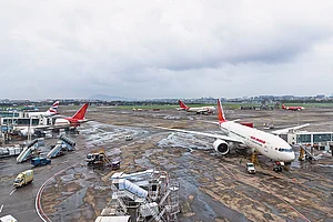 | Photo: Getty Images : Turbulent Times: Air India planes at the Mumbai airport