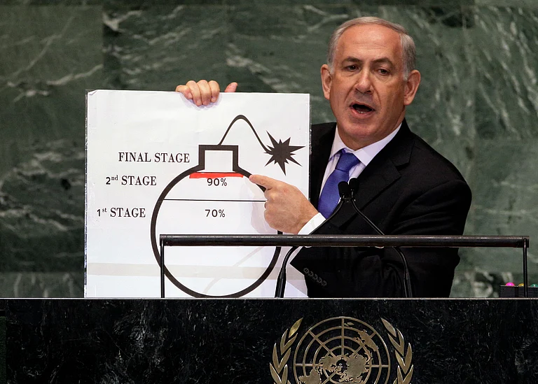 In this Sept. 27, 2012 file photo, Israeli Prime Minister Benjamin Netanyahu shows an illustration as he describes his concerns over Iran's nuclear ambitions during his address to the 67th session of the United Nations General Assembly at U.N. headquarters - AP Photo/Richard Drew, File