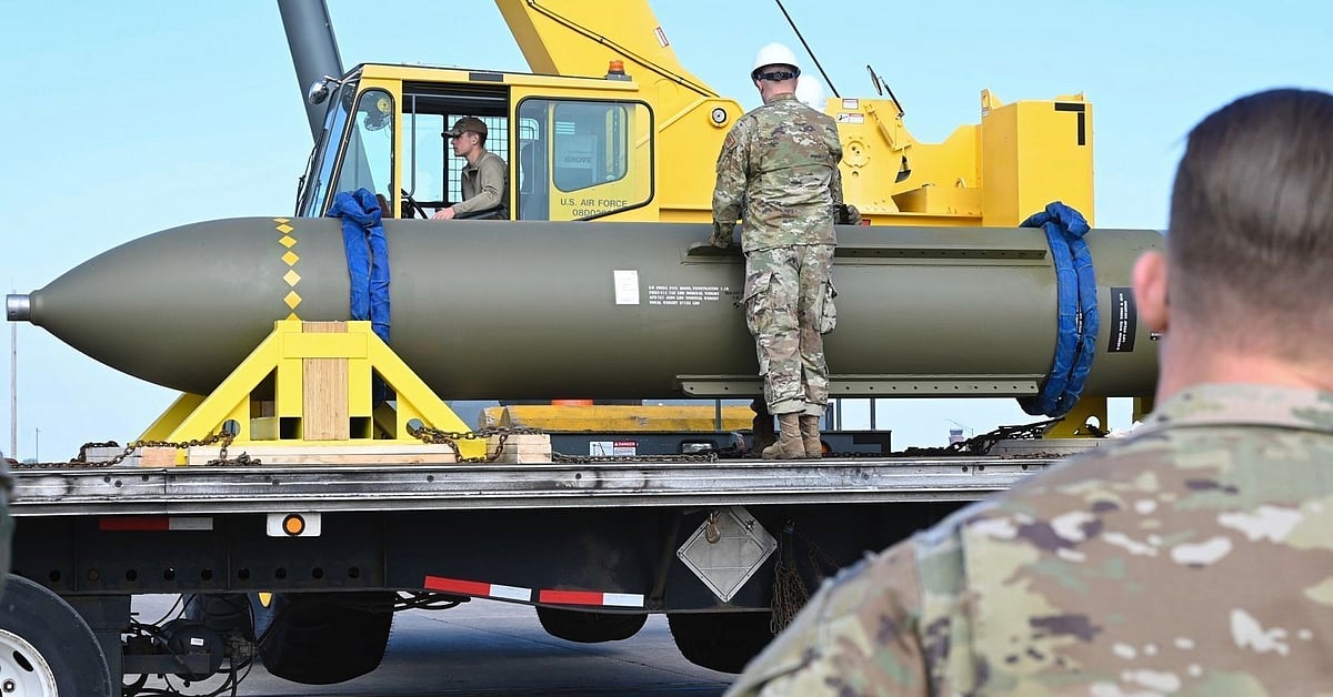 In this photo released by the U.S. Air Force on May 2, 2023, airmen look at a GBU-57, or the Massive Ordnance Penetrator bomb, at Whiteman Air Base in Missouri.(U.S. Air Force via AP, File) - AP