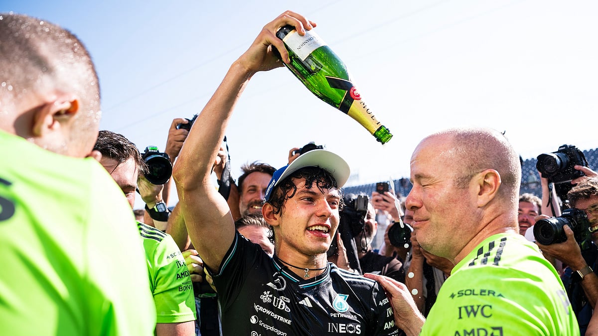 (Christopher Katsarov/The Canadian Press via AP) : Mercedes driver Kimi Antonelli, center, of Italy, celebrates with teammates after the F1 Canadian Grand Prix auto race in Montreal, Sunday, June 15, 2025.