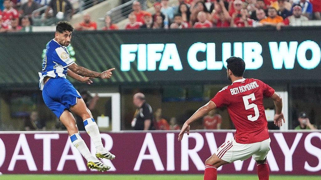 AP/Frank Franklin II : Alan Varela heads the ball as Al Ahly's Mohamed Ali Ben Romdhane reacts during the Club World Cup Group A soccer match between FC Porto and Al Ahly in East Rutherford.
