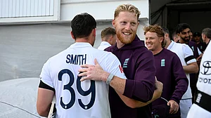 Ben Stokes celebrates England's victory with Jamie Smith