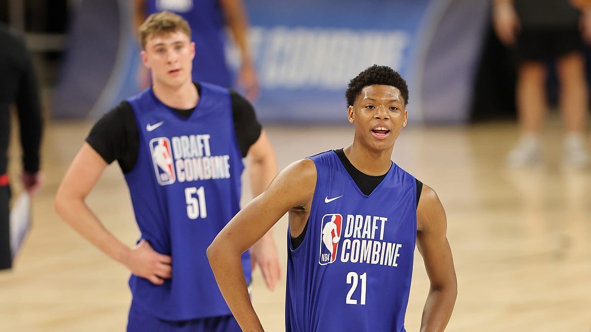 Ace Bailey #21 and Cooper Flagg #51 look on during the 2025 NBA Draft Combine at Wintrust Arena on May 13, 2025 in Chicago, Illinois. - null
