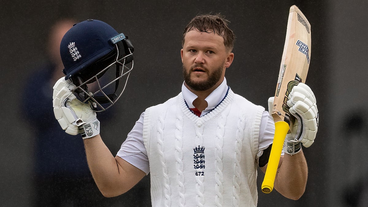 File : India vs England, 1st Test: Ben Duckett celebrates after completing his century.